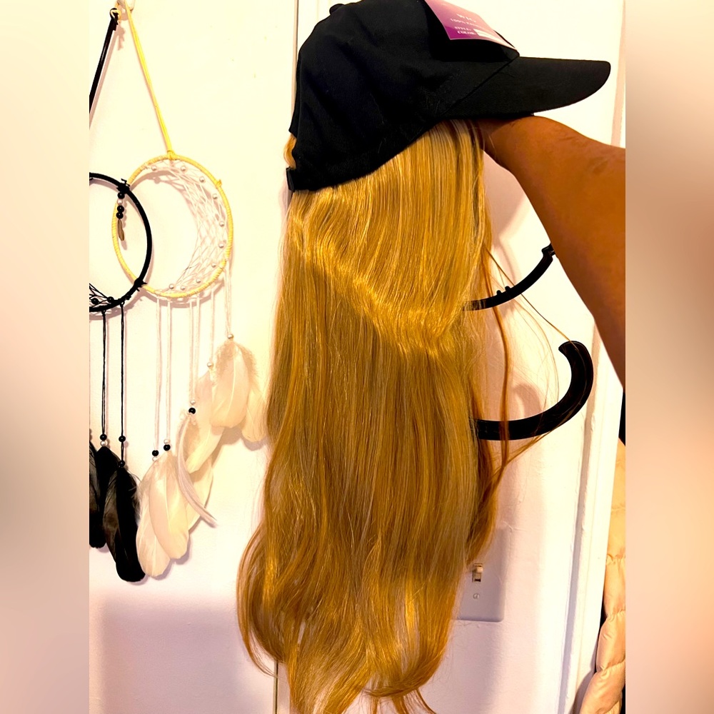 Baseball cap wig, various colors, black, blonde .pictured is blonde with streaks